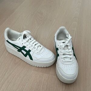 Asics White Sneakers with Green Stripes